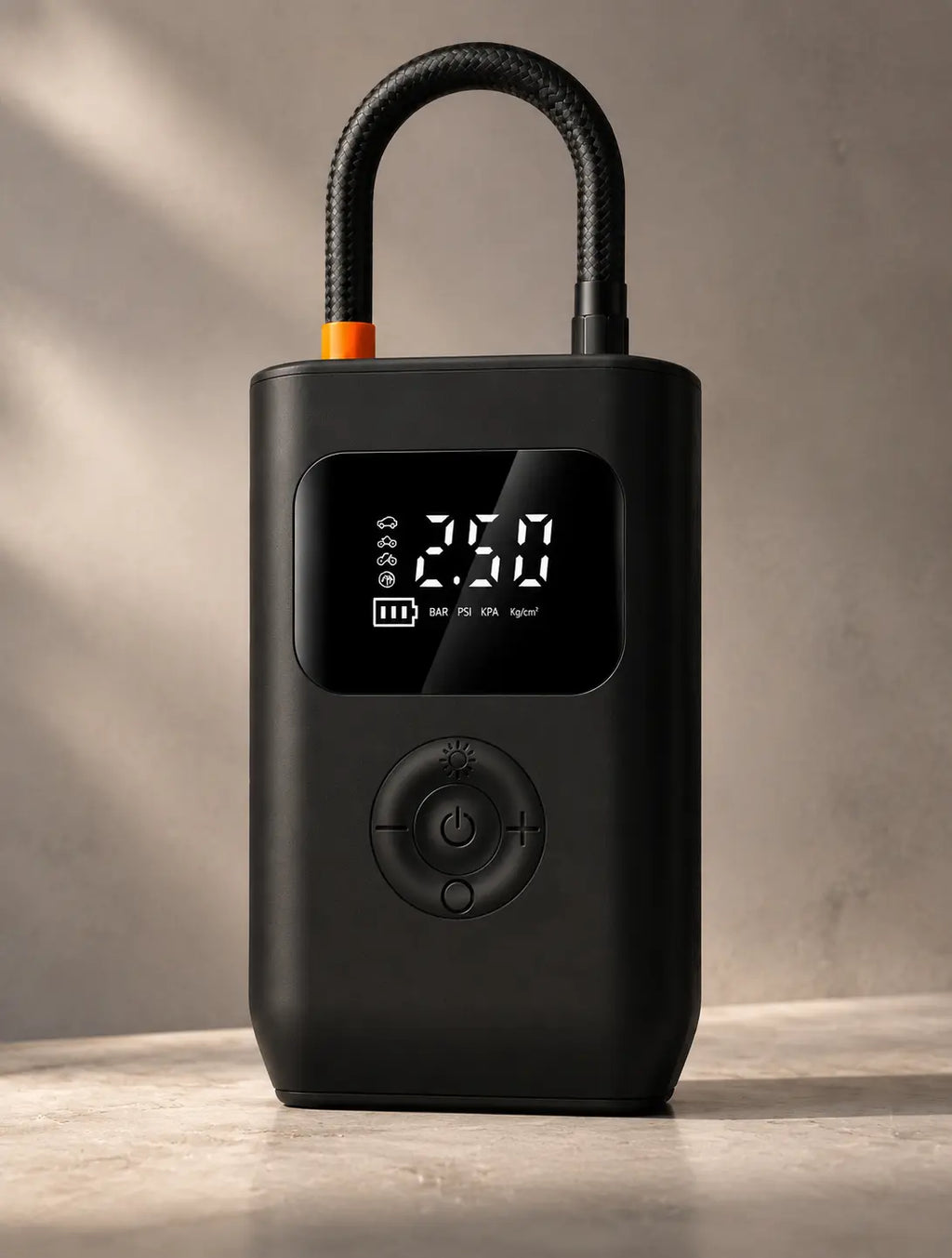 Portable cordless tire inflator with digital pressure display, black compact design